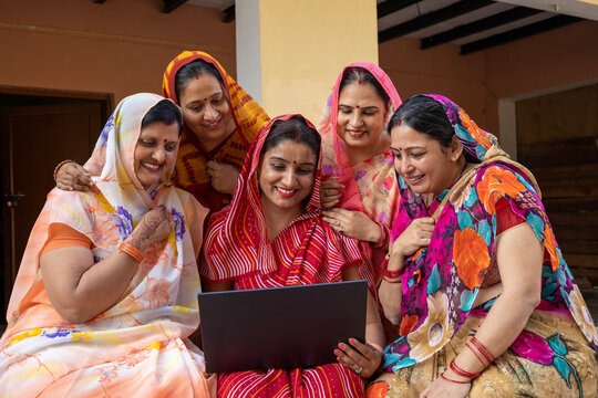 Indian Women Self Help Group with Laptop